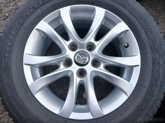 Sada Orig ALU kol Mazda 215/65R16 zimní - 2