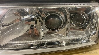 1U1941031 levý světlomet - 2