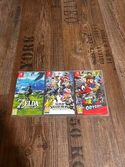 Nintendo Switch OLED + 3 hry a příslušenství - 2