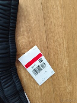 Sportovní dětské tepláky Nike Therma fit L 146-158 - 2