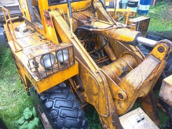 UNK 320 nakladač ZTS díly - 2