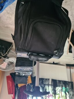 Středně velký látkový kufr, kolečka a madlo - 2
