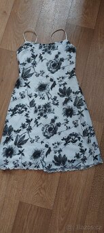 Obleceni damske vel.S - 2