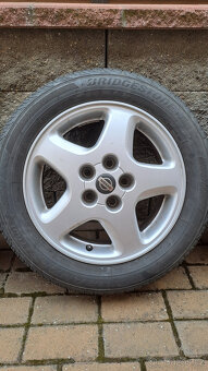 Pneu 205/55 R16 + ALU kola Nissan Almera Tino 6,5x16 ET45 - 2