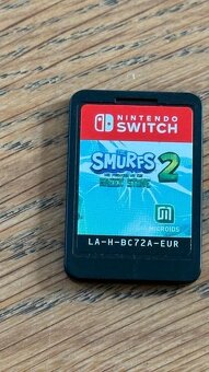 Nintendo Switch OLED + 7 her - 2