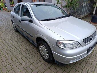 Opel Astra  86000km  Benzín - 2