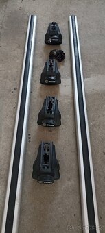 Příčníky Thule délka 135 cm. - 2