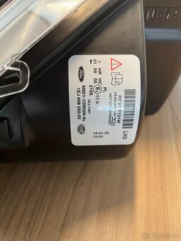 Pravý přední světlomet Ford 1EJ 009 250-02 - 2
