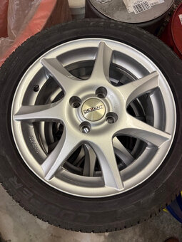 Hliníkové disky VW 4x100 pneu Cooper 185/55 R15 - 2
