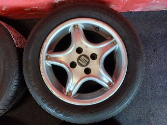 ALU disky 4x100 R14 Seat 6Jx14H2 ET 38 s letními pneu 185/60 - 2