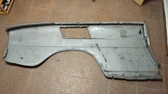Levý zadní blatník na Škoda 110R erko. - 2