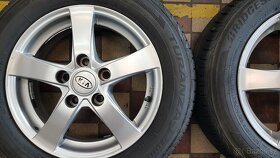 alu kola 15 KIA 5x114,3 6x15 et40 + 185/65/15 4ks 6-7mm - 2