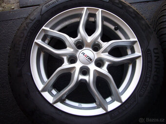 LETNÍ ALU KOLA OPEL ASTRA-J 16" 5x115 6,5" et-38,stř.-70,3 - 2