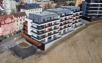 Pronájem nového bytu 1+kk s balkonem, ca 48 m 2,  LBC - 2