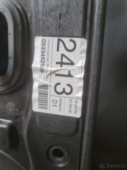 VW Golf 6 5dv. - stahovačka, tapecírunk levý přední - 2