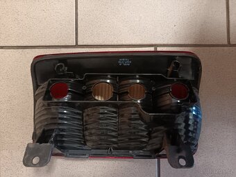 VW Caddy - zadní světlo originál - 2