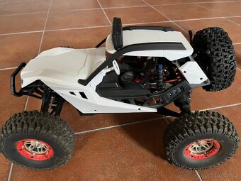 RC auto Buggy Storm Across: 40km/h - jako nový - 2