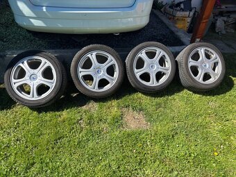 Prodám alu kola s pneu 5x100 r16 - 2