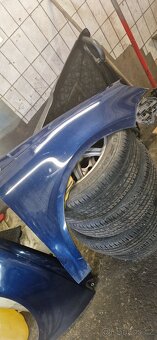 VW Polo 9n3 rok 2009 predni blatniky - 2