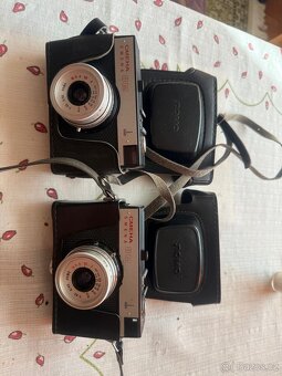 Fotoaparaty zenit et, minolta hi matic f, atd - 2
