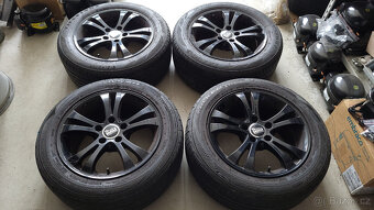Černá letní ALU kola 16" 5x112 Passat B6/B7 - 2