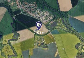 Prodej podílu 1/2 pole 1 986 m², Olomouc - 2