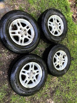 Zimni sada Jeep Cherokee 245/70 R16 5x127 ET 50.8 - 2