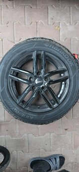 Prodám sadu Dezent TR black+letní pneu - 2