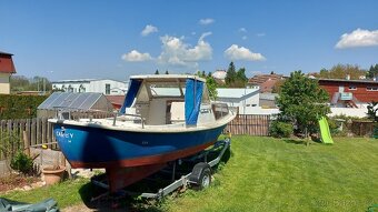 Kajutová loď Myra 21 + přívěs 1,8t - 2