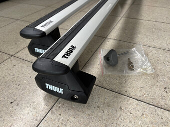 Škoda Rapid střešní uzamykatelné nosiče THULE - 2