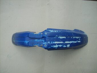 Přední  blatník plast. - 2