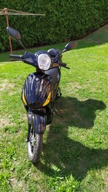 Prodám e- moped - v záruce - 2