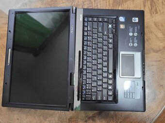 Prodám starší používaný funkční laptop Asus X59SLseri - 2