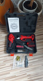 Aku zahradní set: řetěz.pila,nůžky,2xAku,nabíječka,kufr,TOP. - 2