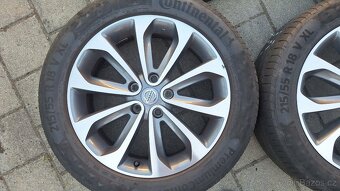 Alu kola Nissan 18" 5x114,3 letní pneu 215/55 R18 4mm - 2