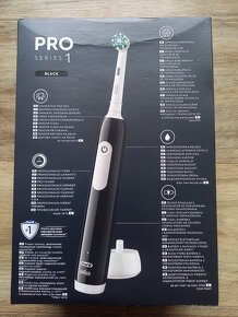 Eletrický zubní kartáček Oral-B Pro 1 černý nový - 2