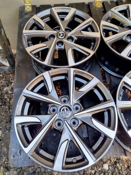 ALU originál Mazda 5x114,3 R16 6,5J ET 50 střed 67mm - 2
