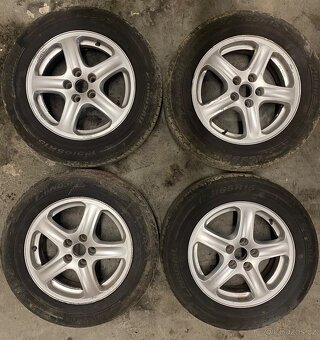 Alu R15 5x100 Oreg Škoda - Vw na slušných letních 195/65 R15 - 2