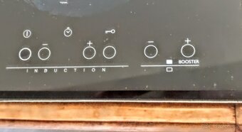 2 varné zóny. Indukční varná deska Whirlpool s rámečkem. - 2
