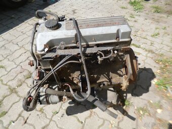 Motor benzin Opel Frontera 2,4 - 2