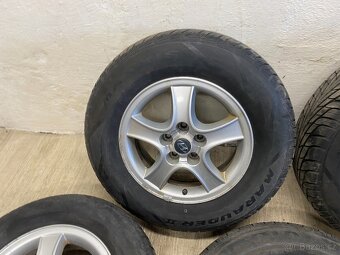 ALU KOLA HYUNDAI R16 5x114,3 6,5Jx16 ET46 S PNEU - 2