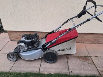 Motorová sekačka se starterem. - 2