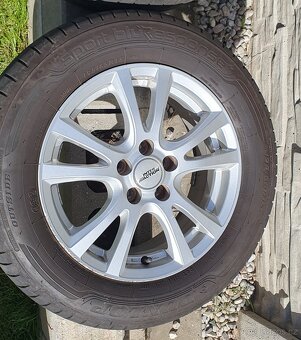Sada ALU kol + pneu Dunlop 195/65 R15 - 2
