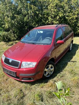 Škoda Fabia 1.4-59Kw,AMB,Alu, park.senzory,STK nova - 2