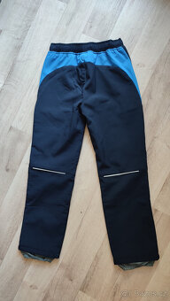 Chlapecké zimní zateplené kalhoty v.140 - 2