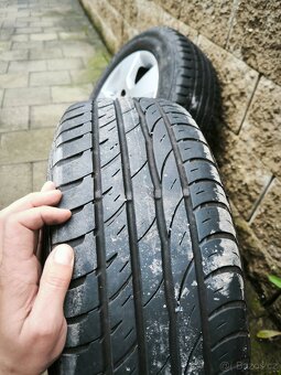 Prodám originální litá kola Škoda,,15,, rozteč 5x112 - 2