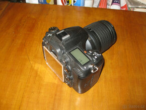Nikon D 7000 Nikon Nikkor AF-S 18-105;mm VR DXs objektivem - 2