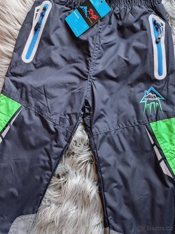 Zateplené šusťákové kalhoty 134 - 2