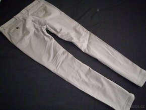 Tommy Hilfiger pánske chino nohavice s elastan. L 36/34 - 2