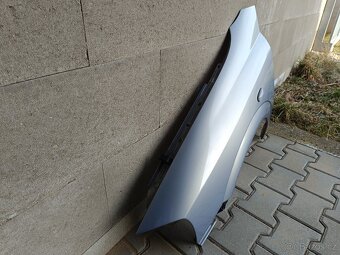 Prodám levý přední blatník na Opel astre g - 2